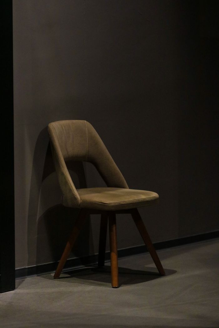 Simple modern chair in a minimalist setting, ideal for decor inspiration.