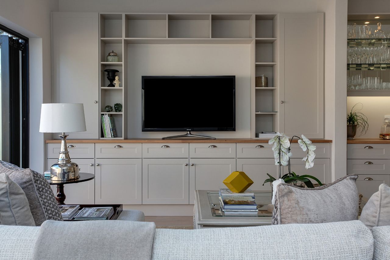 Tv unit Stylish contemporary living room featuring elegant furniture and decor, perfect for home interiors.