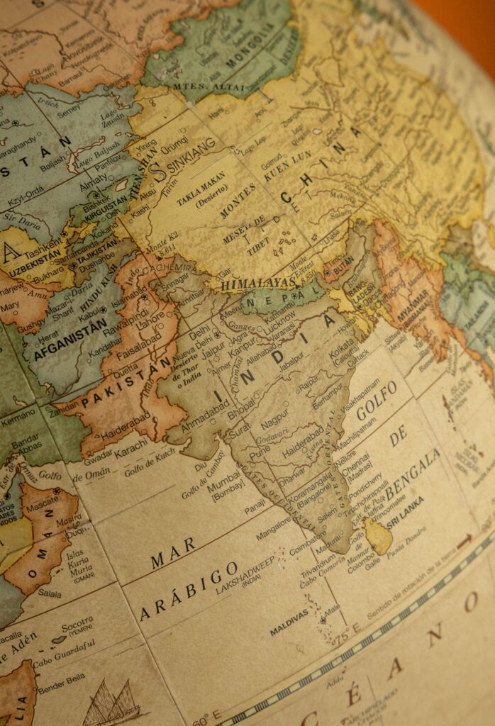 Close-up view of a vintage globe highlighting South Asia, including India and surrounding countries.