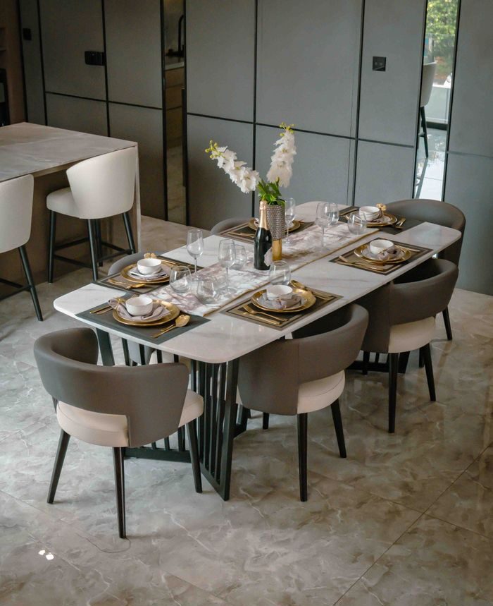 Sleek dining area with a modern table setting and chic design elements.