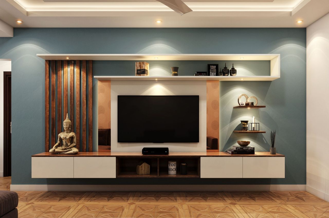 Tv unit Elegant minimalist living room with TV, decorative shelves, and Buddha statue for serene ambiance.