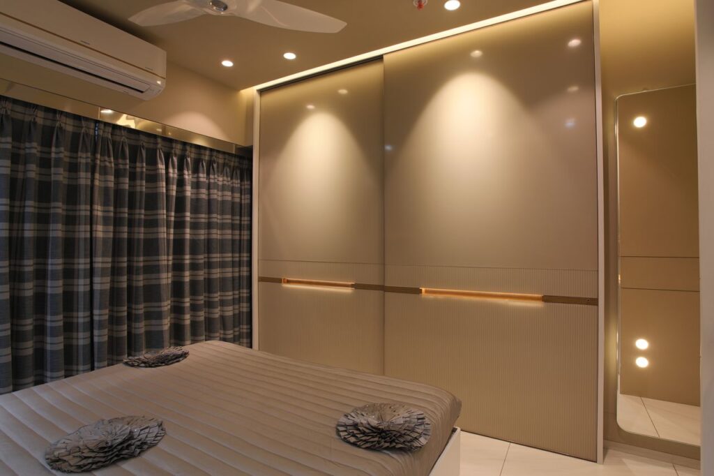 Sleek modern bedroom featuring contemporary design and ambient lighting.